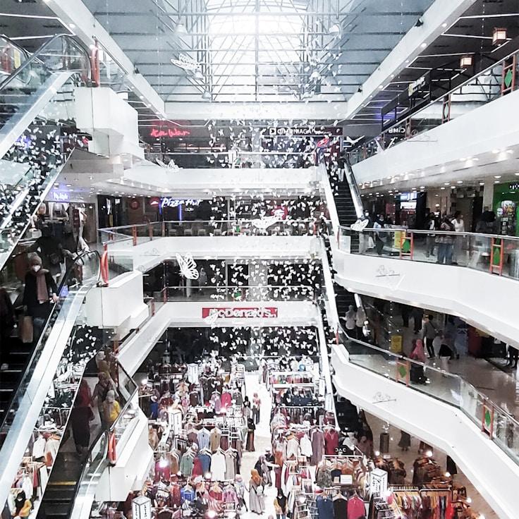 Modern shopping mall interior with family areas